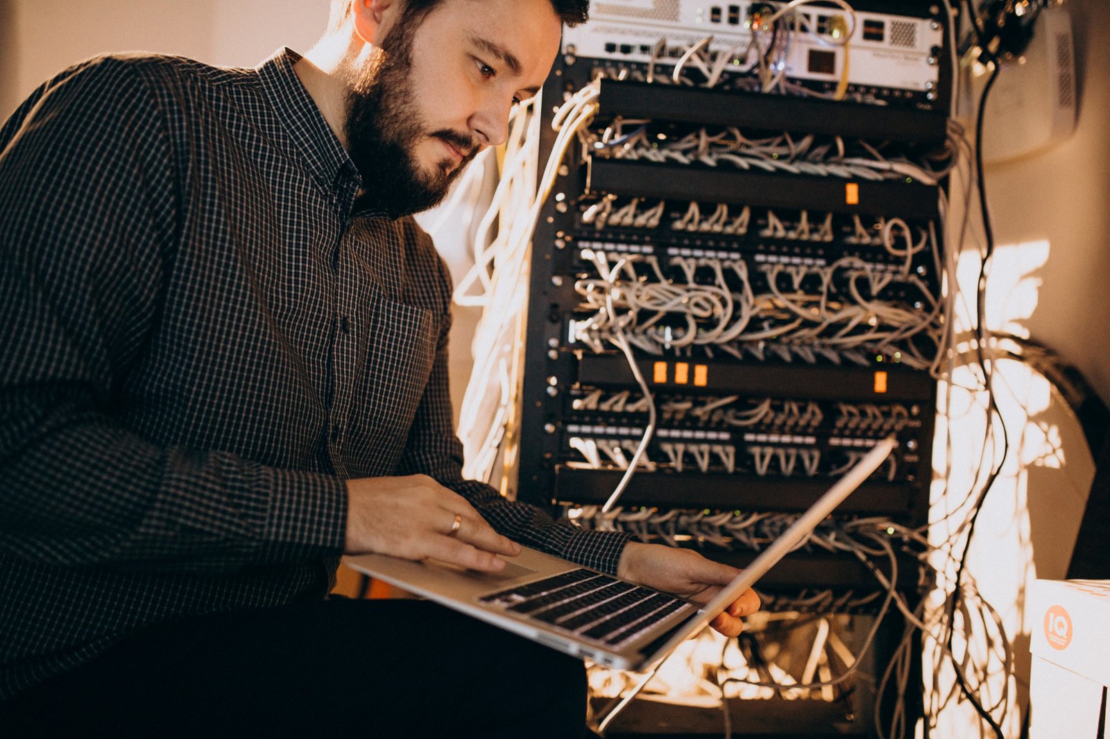 young-it-service-man-repairing-computer